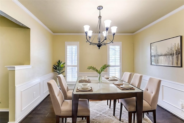 dining room featuring a wealth of natural light, crown molding, and dark wood-style flooring