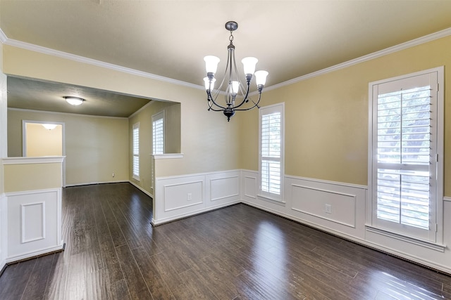 unfurnished dining area featuring a wealth of natural light, dark wood-type flooring, and crown molding