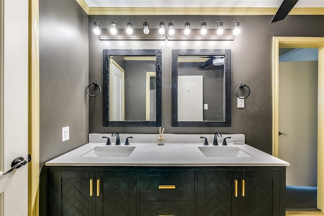 bathroom featuring double vanity and a sink