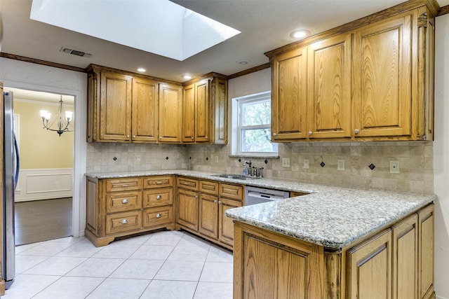 kitchen featuring ornamental molding, visible vents, and brown cabinets