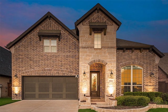 mediterranean / spanish house featuring a garage