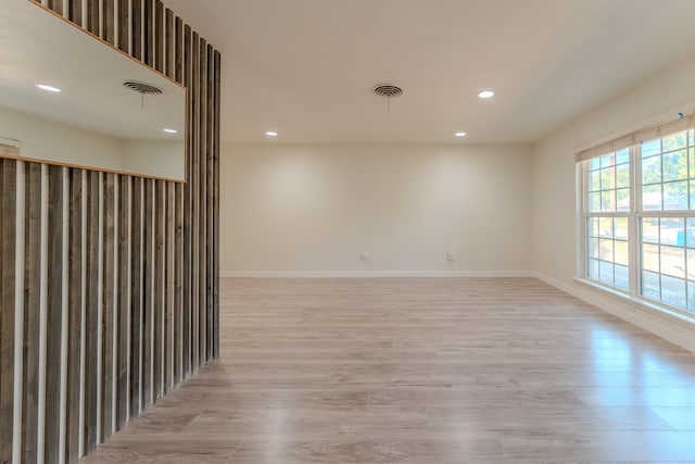 empty room with light wood-type flooring