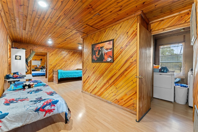 bedroom with wooden walls, hardwood / wood-style floors, and wooden ceiling