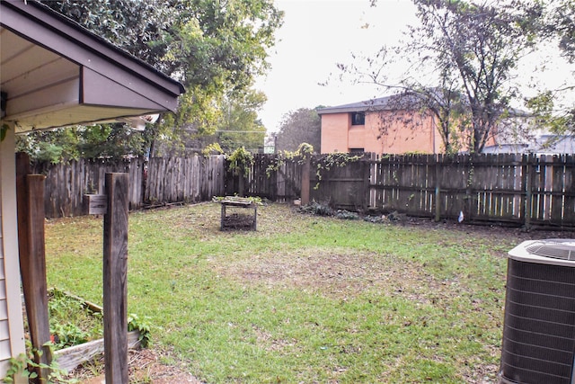 view of yard featuring central AC