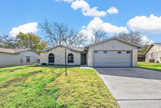 single story home with central AC unit, a garage, and a front lawn