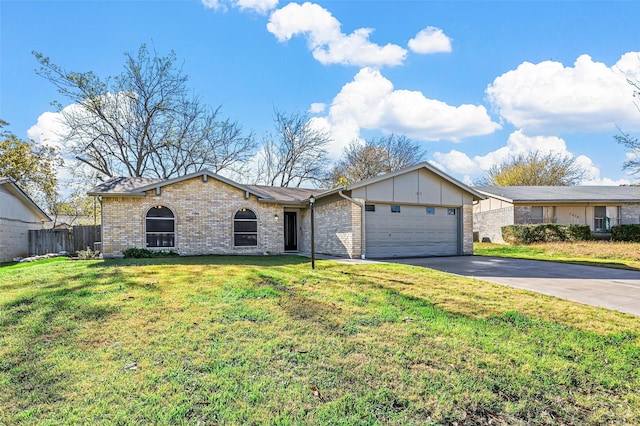 single story home featuring a garage and a front lawn