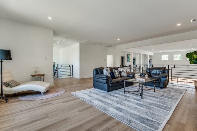 living room with light hardwood / wood-style floors