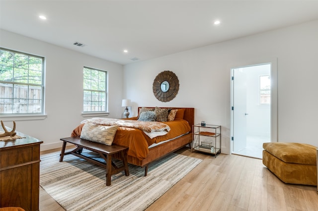 bedroom featuring light wood-type flooring