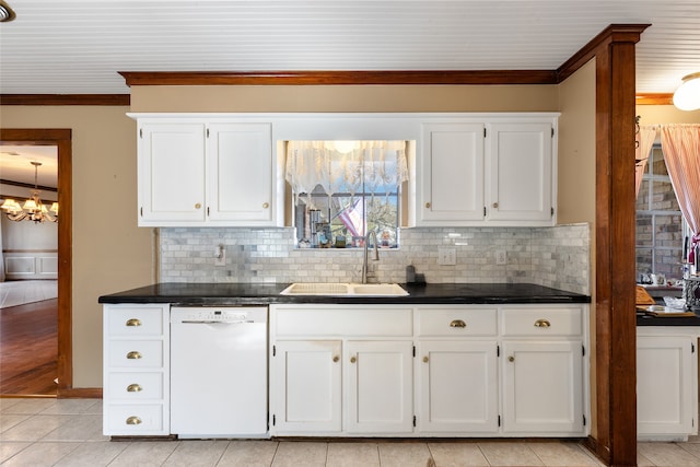 kitchen with white cabinetry, tasteful backsplash, white dishwasher, crown molding, and sink