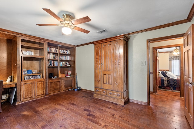 office area with ceiling fan, dark hardwood / wood-style flooring, and crown molding