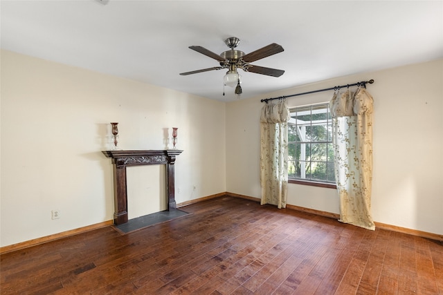 unfurnished living room with ceiling fan and hardwood / wood-style flooring