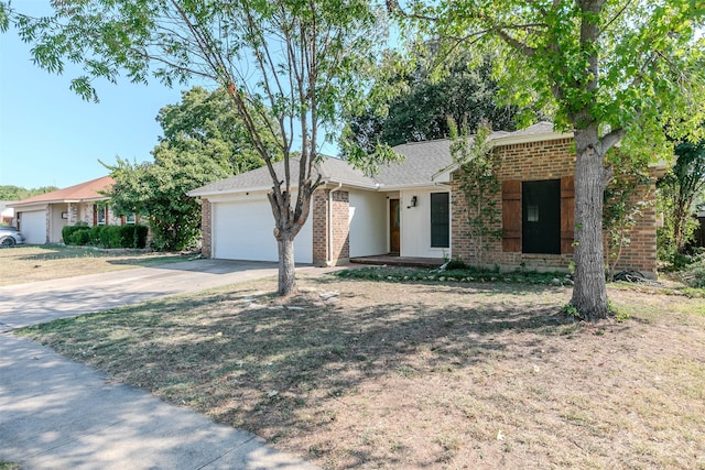 ranch-style home featuring a garage