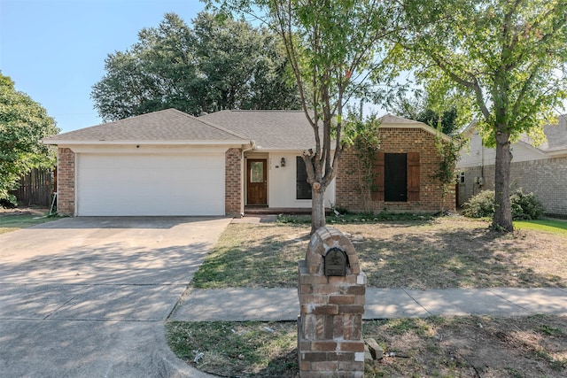 ranch-style house featuring a garage