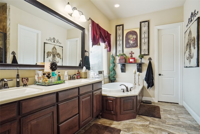 bathroom with vanity and a tub to relax in