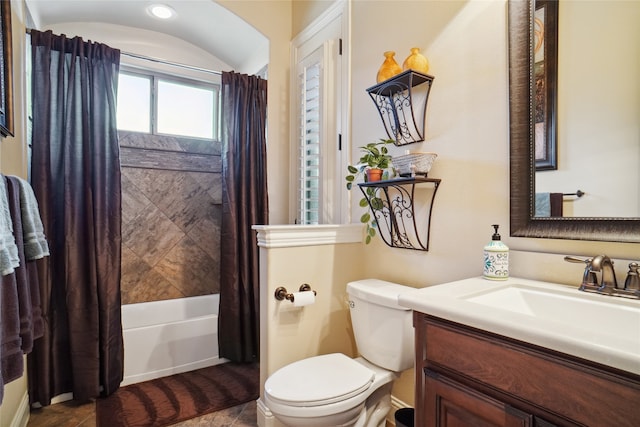 full bathroom featuring vanity, shower / tub combo, toilet, and tile patterned flooring