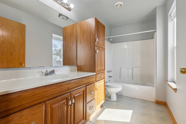 full bathroom with vanity,  shower combination, and toilet