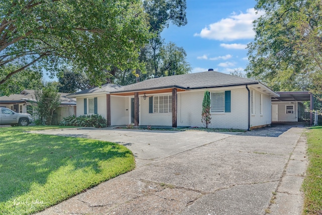 ranch-style home with a front lawn