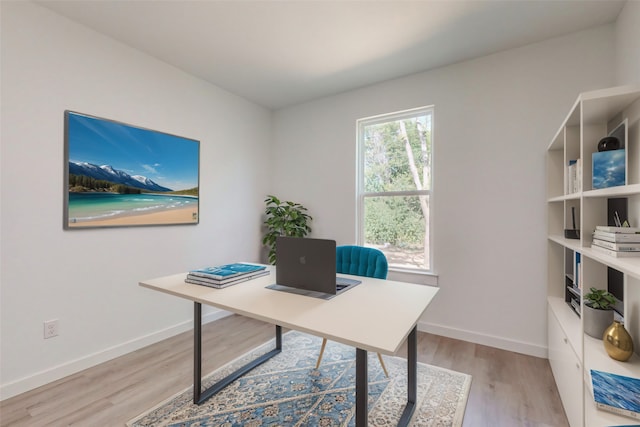 home office featuring light wood-type flooring