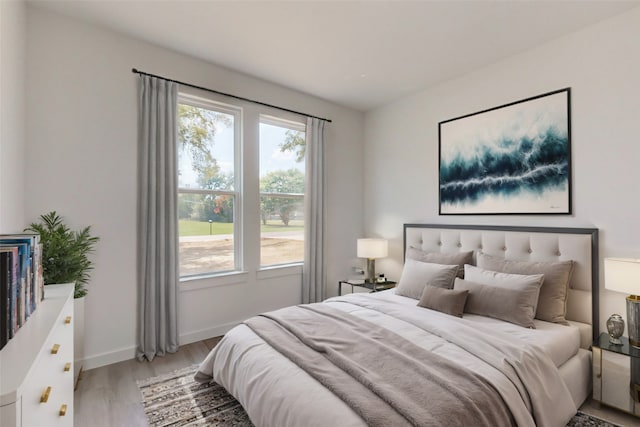 bedroom featuring wood-type flooring