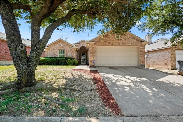 single story home with a garage