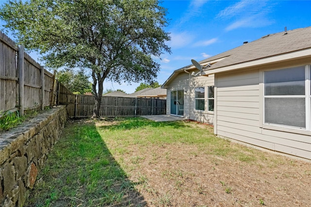 view of yard with a patio area