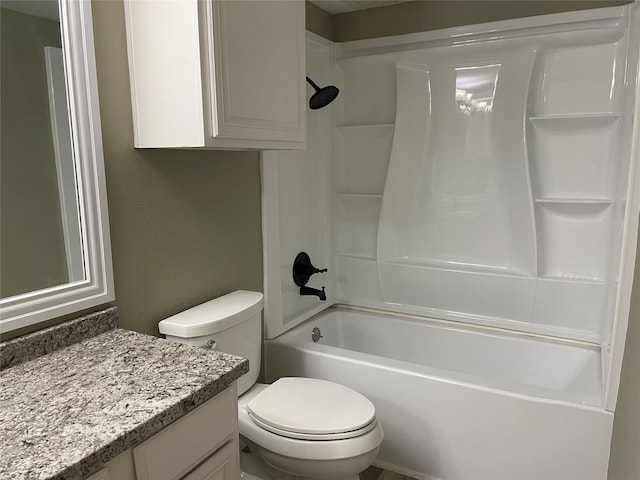 full bathroom with shower / tub combination, vanity, and toilet