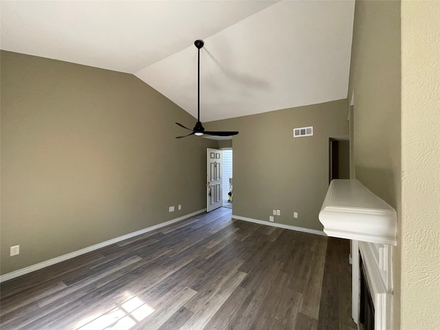 unfurnished living room featuring dark hardwood / wood-style floors, ceiling fan, and lofted ceiling