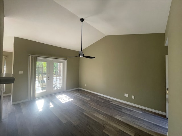 unfurnished dining area featuring french doors, dark hardwood / wood-style floors, vaulted ceiling, and ceiling fan