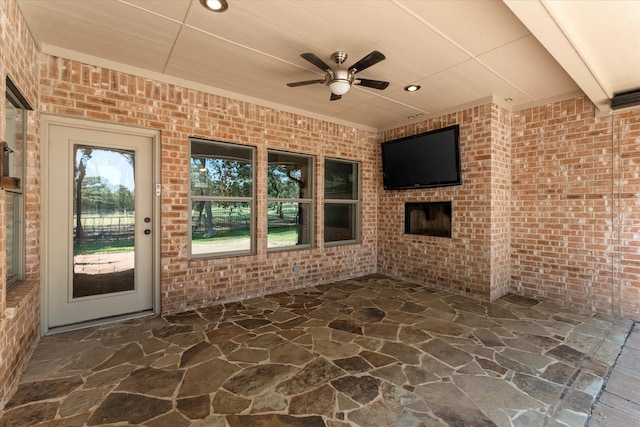 view of patio with ceiling fan