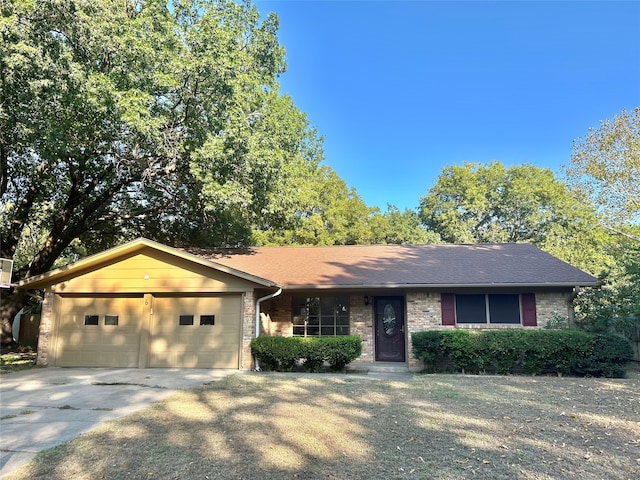 ranch-style house with a garage