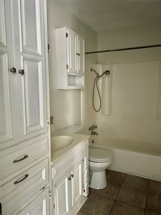 full bathroom featuring tile patterned floors, toilet, vanity, and  shower combination