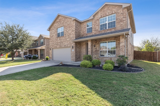 view of front of house with a garage and a front lawn