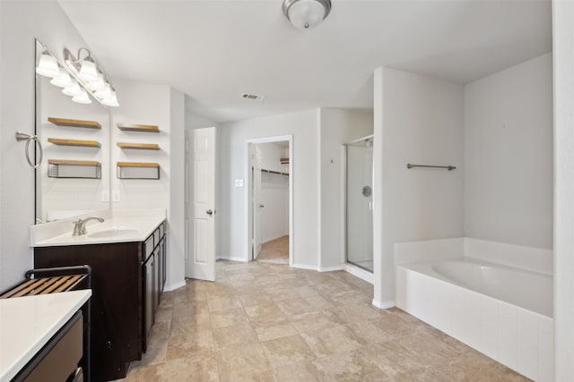 bathroom with vanity and plus walk in shower