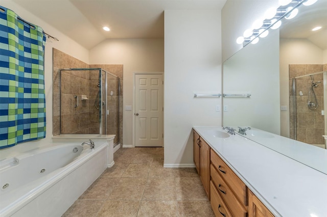 bathroom featuring tile patterned flooring, vanity, independent shower and bath, and lofted ceiling