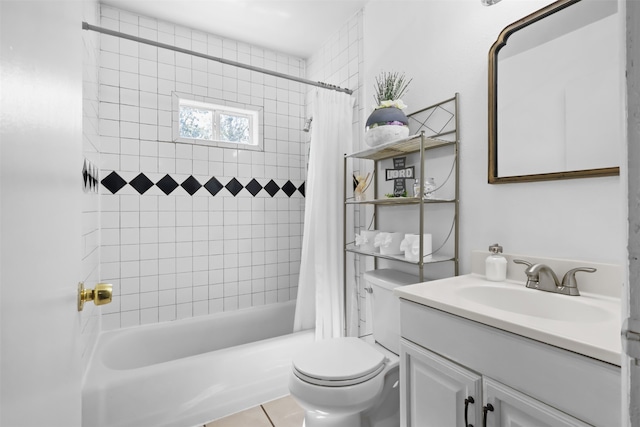 full bathroom with vanity, shower / tub combo, toilet, and tile patterned floors