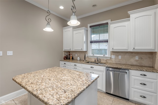 kitchen with white cabinets, decorative light fixtures, stainless steel dishwasher, and a kitchen island