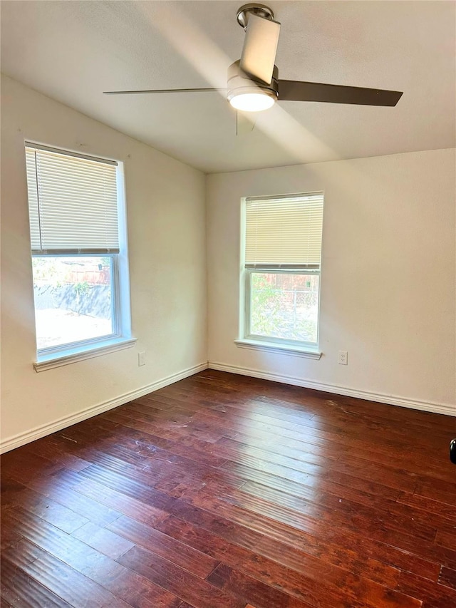 729 N Ruddell St, Denton, TX 76209 - spare room with a ceiling fan, wood-type flooring, and baseboards