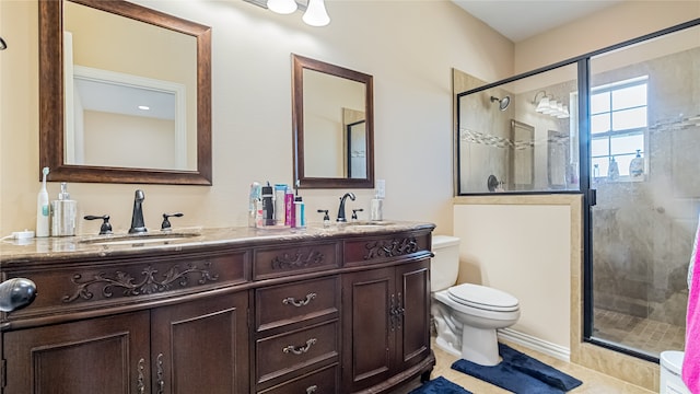 bathroom featuring an enclosed shower, tile patterned floors, vanity, and toilet