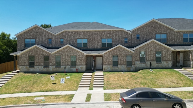 view of front facade with a front lawn