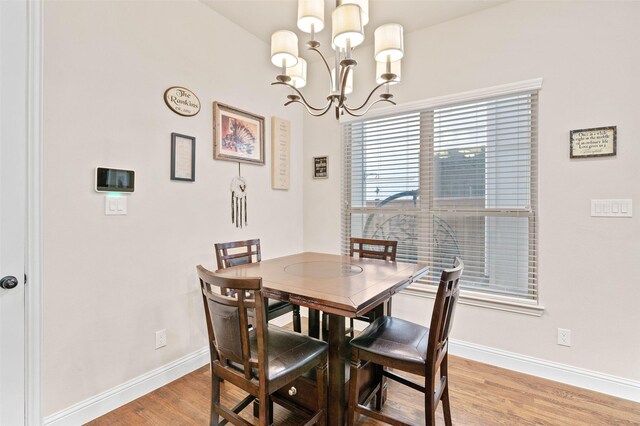 kitchen with tasteful backsplash, white cabinetry, light stone countertops, and stainless steel appliances