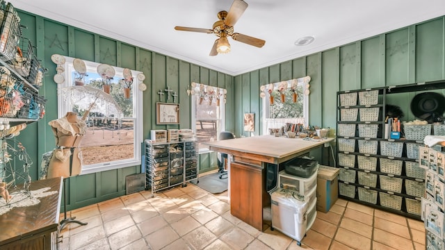 kitchen with crown molding, green cabinetry, plenty of natural light, and ceiling fan