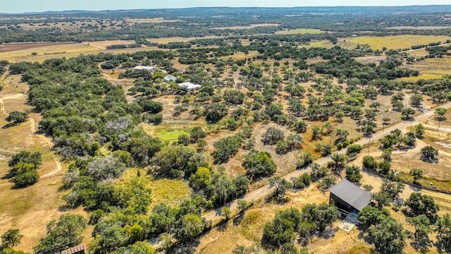 birds eye view of property featuring a rural view