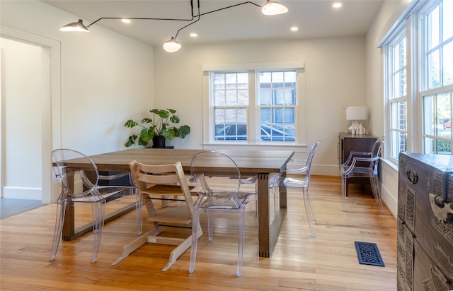 dining room featuring light hardwood / wood-style flooring