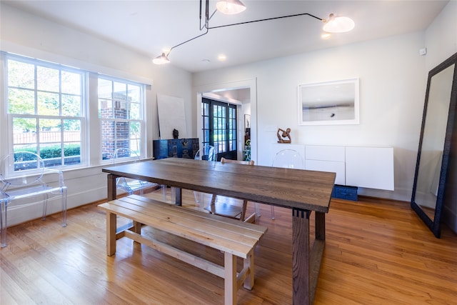 dining area featuring light wood-type flooring