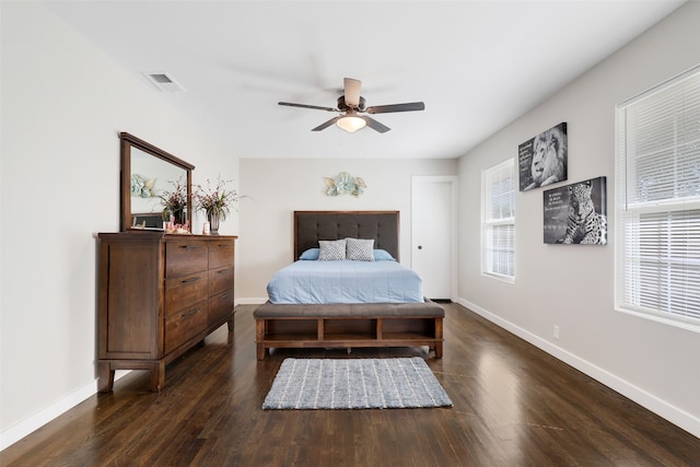 bedroom featuring dark wood-type flooring and ceiling fan