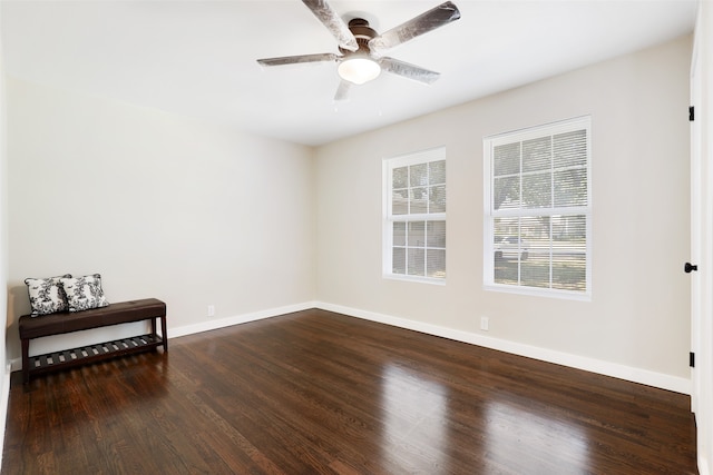 unfurnished room featuring hardwood / wood-style flooring and ceiling fan