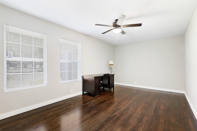 interior space featuring dark wood-type flooring and ceiling fan