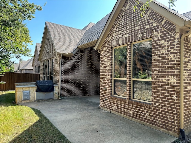 view of home's exterior featuring a patio area