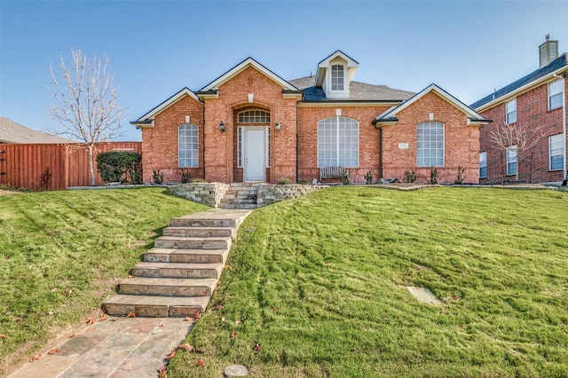 front facade with a front yard