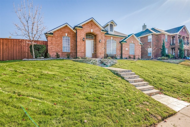 front facade with a front lawn